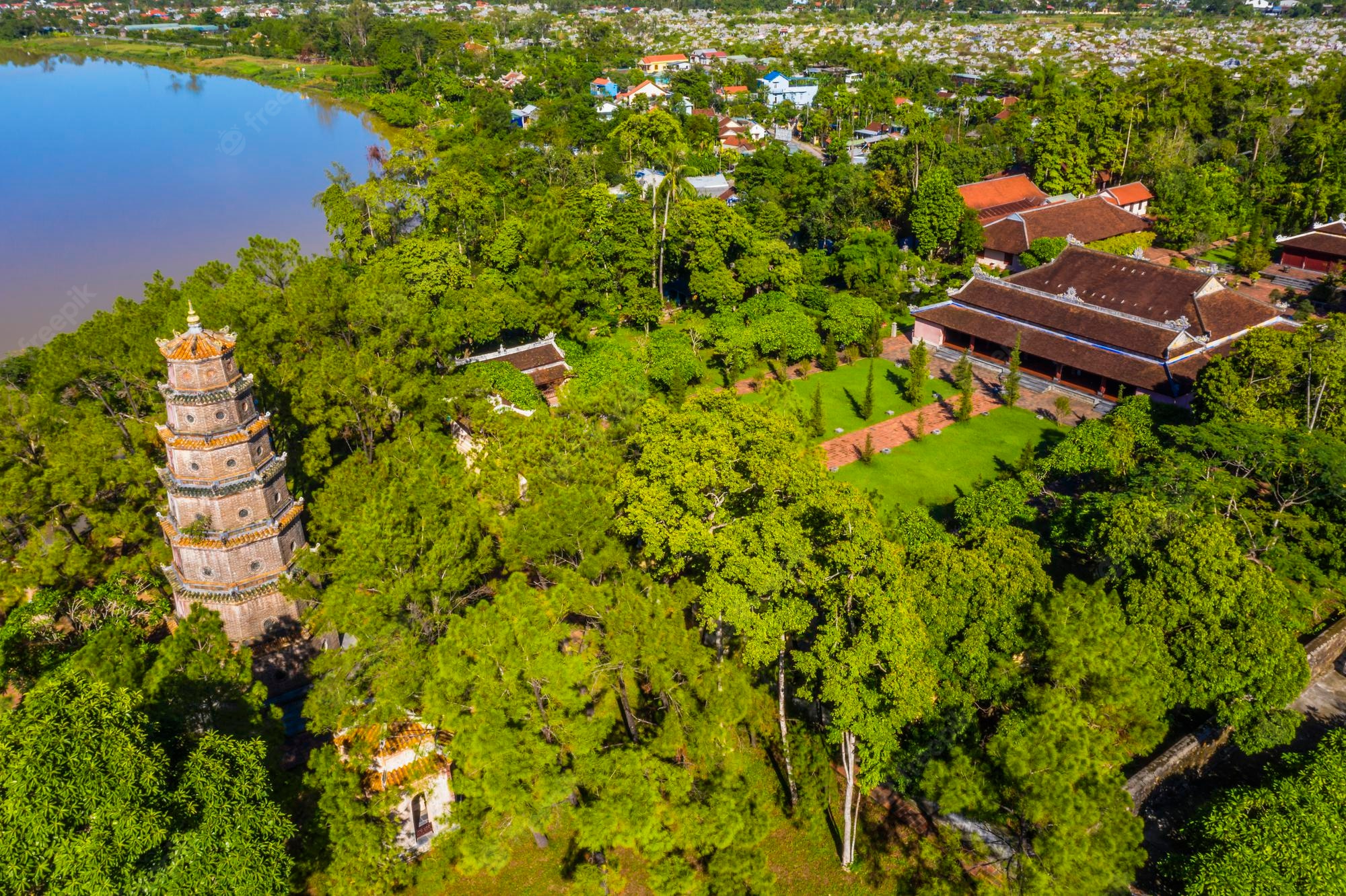Premium Photo | Aerial view of the thien mu pagoda. it is one of the ancient pagoda in hue city. it is located on the banks of the perfume river in vietnam's